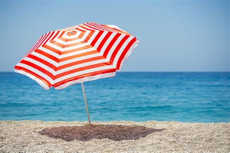 How To Put An Umbrella In The Sand