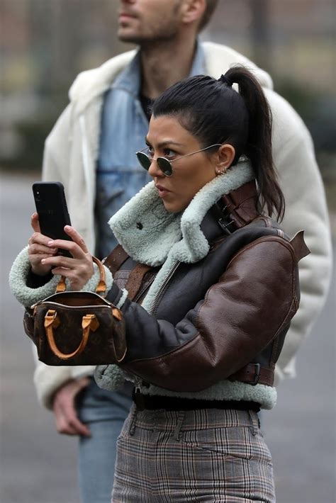 Wearing Her Sunglasses With A Mini Shearling Jacket Kourtney Kardashian Sunglasses Kardashian