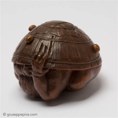 Netsuke were invented out of the necessity of preventing items that were hung on the person and carried netsuke — small, finely carved figures in ivory, wood, bone, lacquer, metal and porcelain. Wood netsuke with an oni hiding under a hat | GIUSEPPE ...