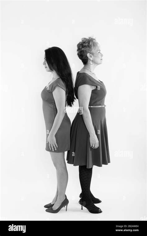 Full Body Shot Profile View Of Senior Asian Woman And Young Beautiful Woman Standing Back To