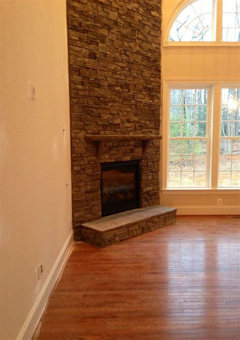 A stone fireplace can greatly enhance any home's design aesthetic, exuding a rustic elegance how to update your fireplace with stone. Pin by Sheron Peiker on Making a House a Home | Corner ...