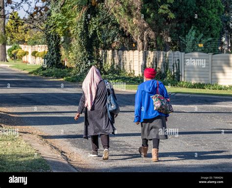 Johannesburg South Africa Two Unidentified Black Women Walk Home In