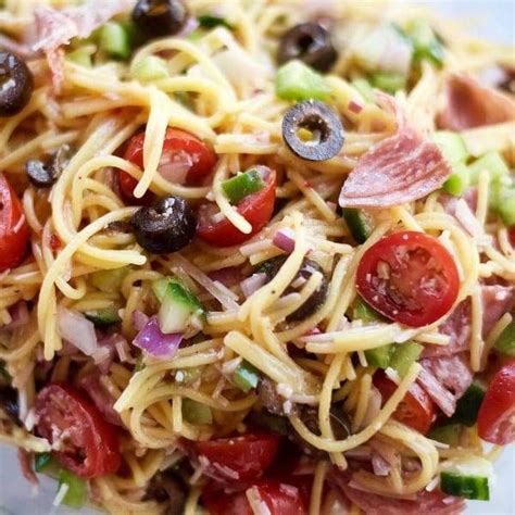 Our famous spaghetti salad is the perfect dish to bring to a pot luck dinner. SUMMER ITALIAN SPAGHETTI SALAD from Reluctant Entertainer ...