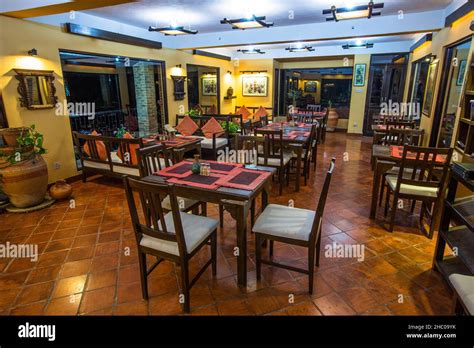The Dining Room At Night At The Chhahari Retreat A Boutique Lodge In Kathmandu Nepal Stock