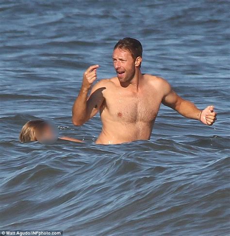 Shirtless Chris Martin Enjoys A Beach Day With Daughter Apple Daily Mail Online