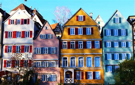 white pink yellow  teal painted houses  stock photo