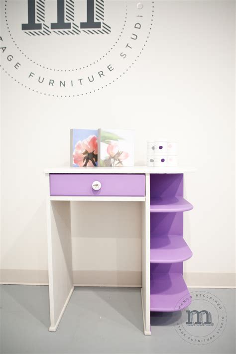 The child with long chic hair and a beautiful body smiles charmingly. A sweet girls desk for a sweet little girl. — mango reclaimed