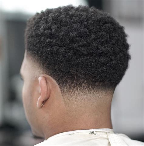 This haircut will look nice on men who wear glasses as the curls are falling naturally over the forehead with sides that are faded till the beginning of the beard on the face. Top 25 Haircuts For Men 2018