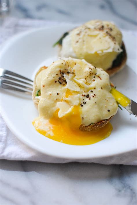 Place a warmed trimmed poached egg on each bead of spinach. Poached Egg Florentine with Creamy Butter Sauce | Poached ...