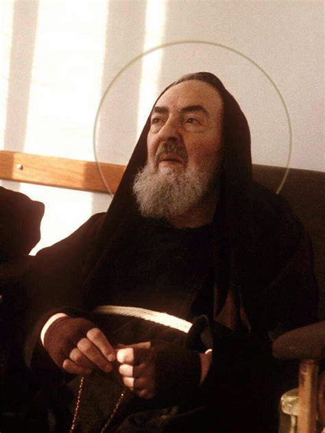 St Pio Praying The Rosary Photograph By Samuel Epperly