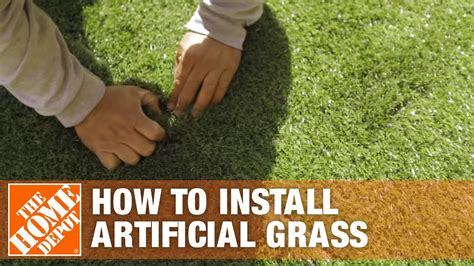 Laying out the artificial grass. How to Install Artificial Grass | The Home Depot - DIY ...