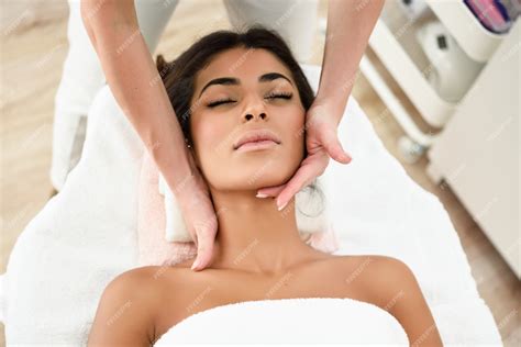 Premium Photo Woman Receiving Head Massage In Spa Wellness Center