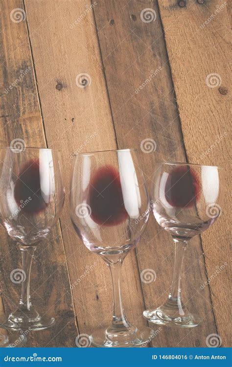 Flat Lay Red Wine In Glasses On Wooden Background With Space Concept