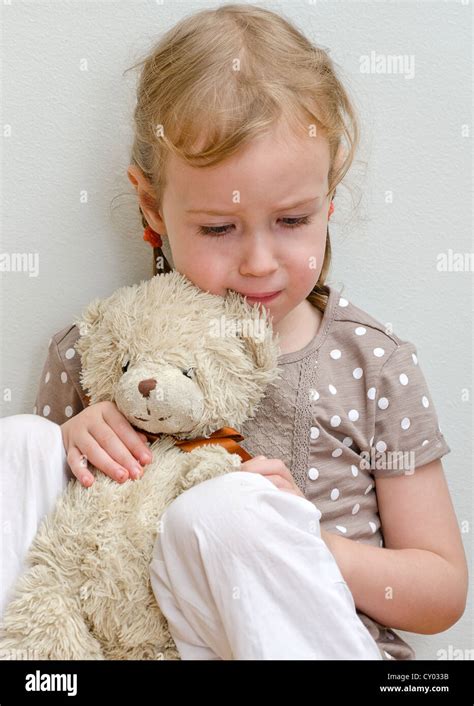 Sad Child With Teddy Hi Res Stock Photography And Images Alamy