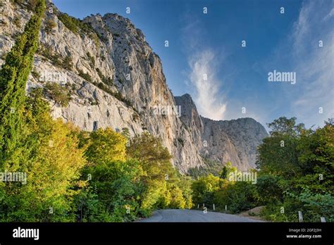Road Between Mountains Stock Photo Alamy