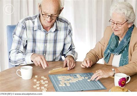 A Senior Couple Playing A Board Game Together Activities For Seniors