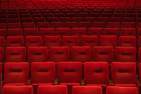 Red Theatre Seats In Rows By Stocksy Contributor Pixel Stories