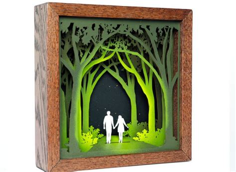 Artist creates intricate shadowboxes out of laser cut wood pieces