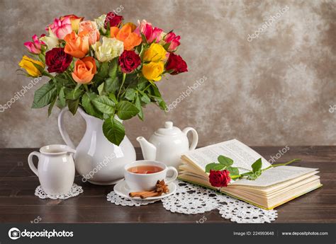 Still Life Roses Tea Book Table Stock Photo By ©timmary 224993648