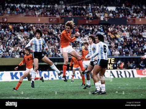 world cup final 1978 holland v argentina football johnny rep in air centre passarella stock