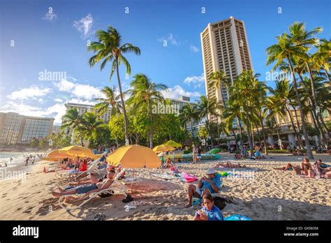 Waikiki Beach Sunbathing Stock Photo Alamy
