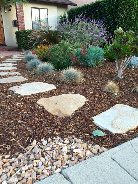 Paving Stone Pathway Surrounded By Mulch Bark And Complete 56