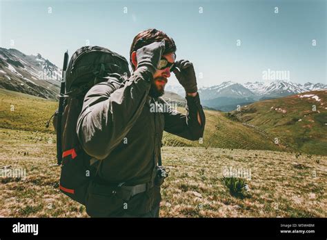 Backpacker Man Hiking In Mountains Travel Lifestyle Survival Concept