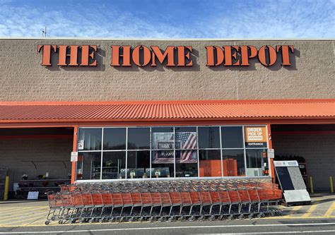 Download Home Depot Stacked Shopping Carts Wallpaper