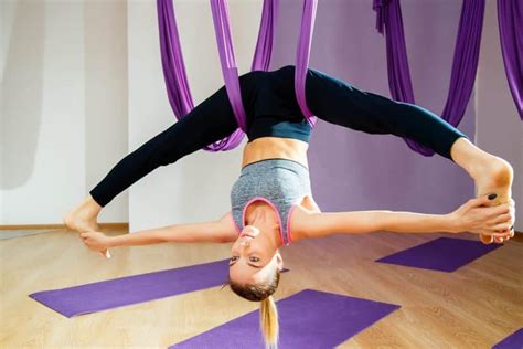 taking up aerial yoga and its benefits for health and wellness