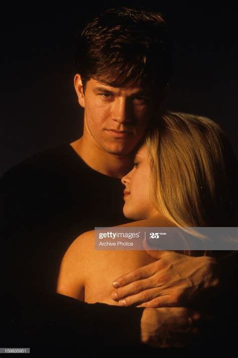 Mark Wahlberg Holding Reese Witherspoon In Publicity Portrait For The Mark Wahlberg Fear