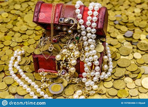 Vintage Treasure Chest Full Of Gold Coins And Jewelry On A Background ...