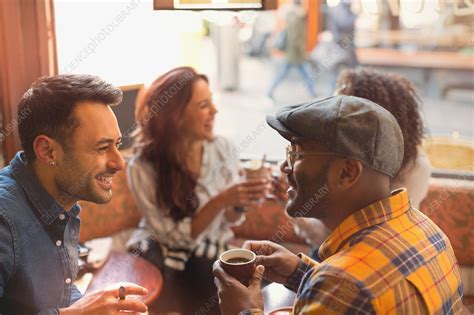 Friends Talking And Drinking Coffee In Cafe Stock Image F0186250
