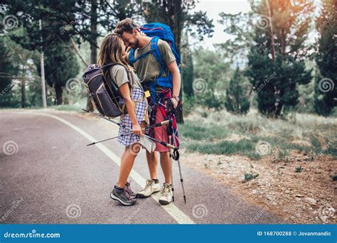 Couple Hiking On The Path In Mountains Stock Photo Image Of Hiker