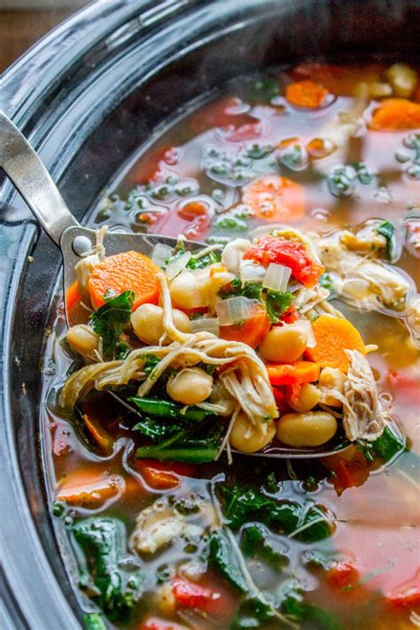 Place all the ingredients in a crock pot. Slow Cooker Chicken, White Bean, and Kale Soup with ...