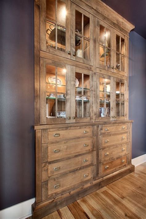 The hutch features open shelves to display china Hutc Cabinet Built in Hutch Dining room with built in ...