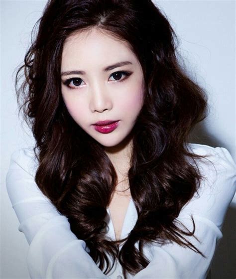 Run a styling cream through hair before blow drying. 16 Fascinating Asian Hairstyles - Pretty Designs