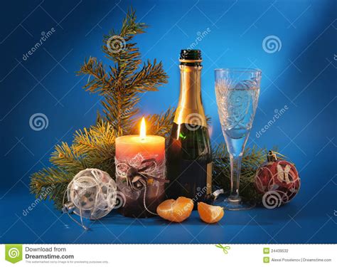 New Year Still Life With A Candle And Champagne Stock Photo - Image of ...