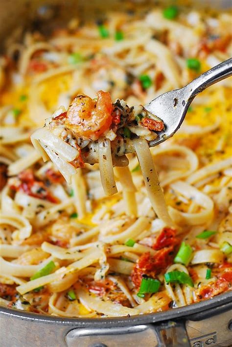 Grilled sausage with rustic vegetables and pasta. Garlic Shrimp and Sun-Dried Tomatoes with Pasta in Spicy ...