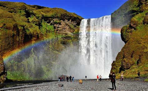 Skógafoss Waterfalls Below The Eyjafjöll Mountains And West Of