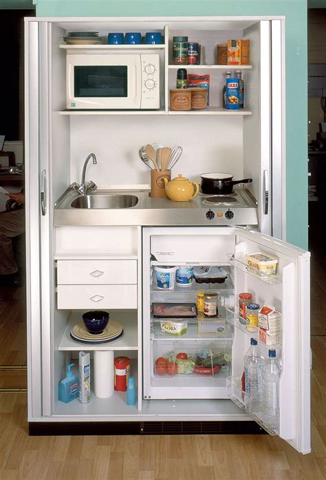 An Open Refrigerator With Its Door Wide Open