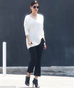 Sandra Bullock Glows In White V Neck Sweater And Cropped Trousers