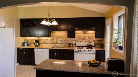 For contrast, she chose an emerald green tone from the wallpaper to paint the kitchen's island. Kitchen design white appliances dark cabinets - YouTube