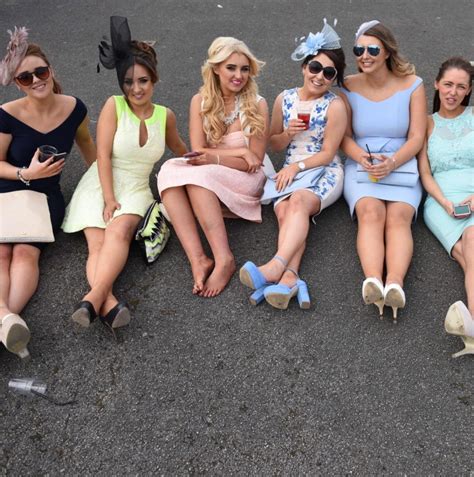 Racegoers Dress Up For Ladies Day At Aintree Racecourse