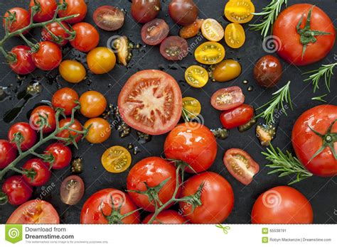 Tomato Varieties On Black Overhead View Stock Image
