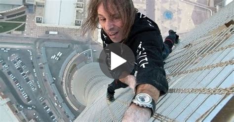 It could only take place on the tallest building in the world! Alain Robert Extreme Urban Free Solo Climber The Real ...