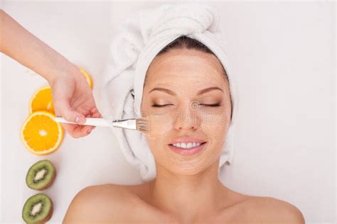 Cheerful Girl Is Having Facial Beauty Treatment Stock Image Image Of