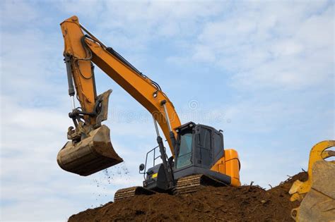 Backhoe Digging Hydraulic Shovel On Construction Site Earth Mover