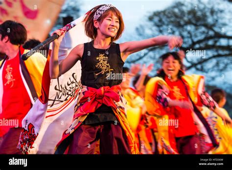 Japan Yosakoi Festival Night Time Mixed Sex Dance Team In Orange Yellow Yukata Dancing On