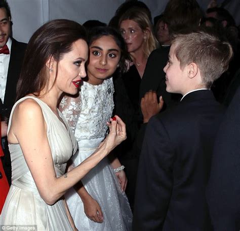 Angelina Jolie Radiates Glamour Showcasing Enchanting Elegance And