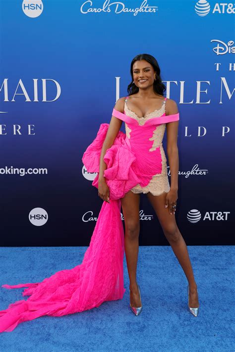 Simone Ashley Trades A Tail For A Hot Pink Train At The Premiere Of The